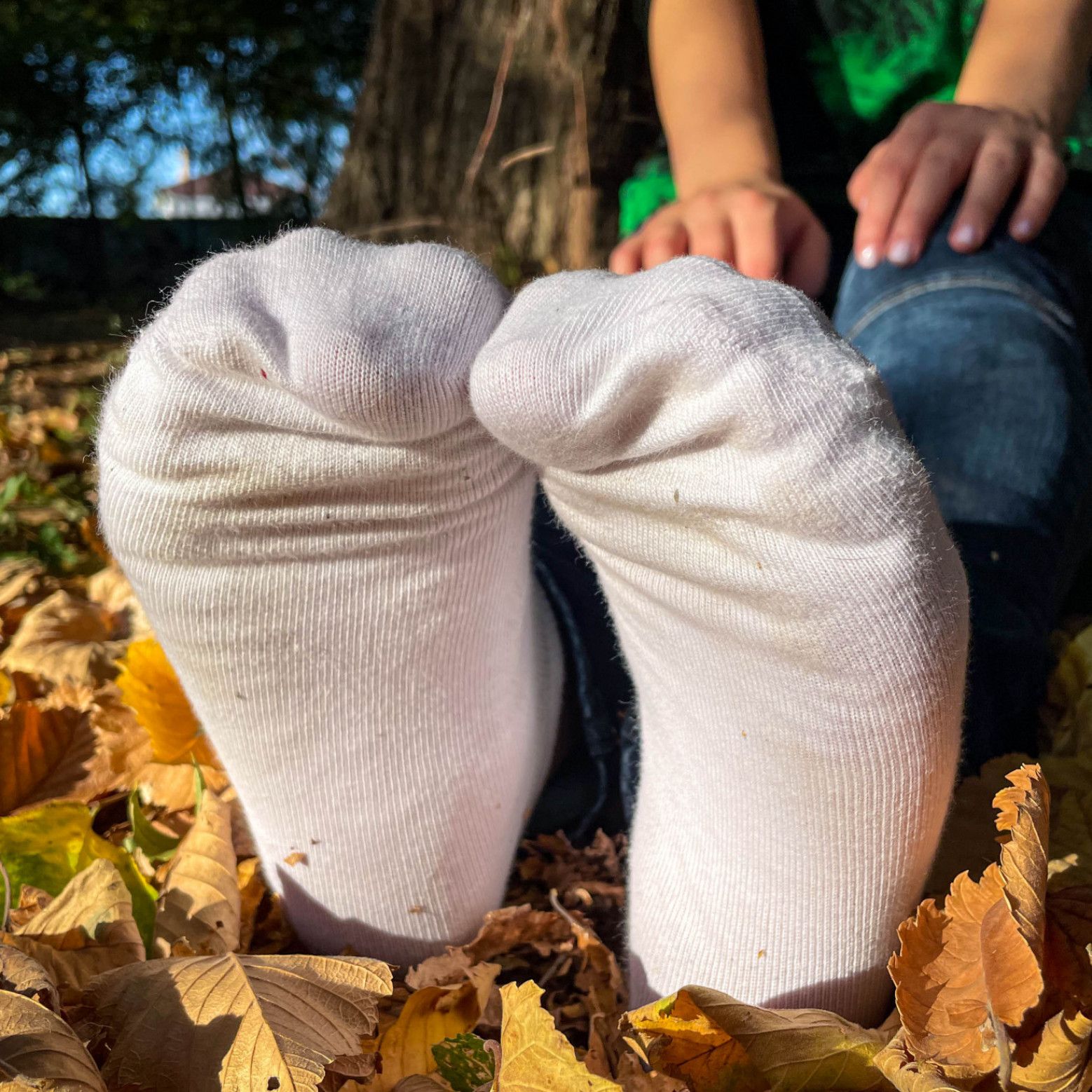 Cute feet in red and white socks and just barefoot