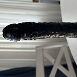 Reused Black Dildo