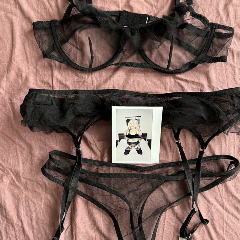 Black see thru lingerie and Polaroid