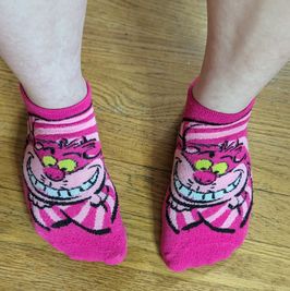 Worn  Cheshire cat socks