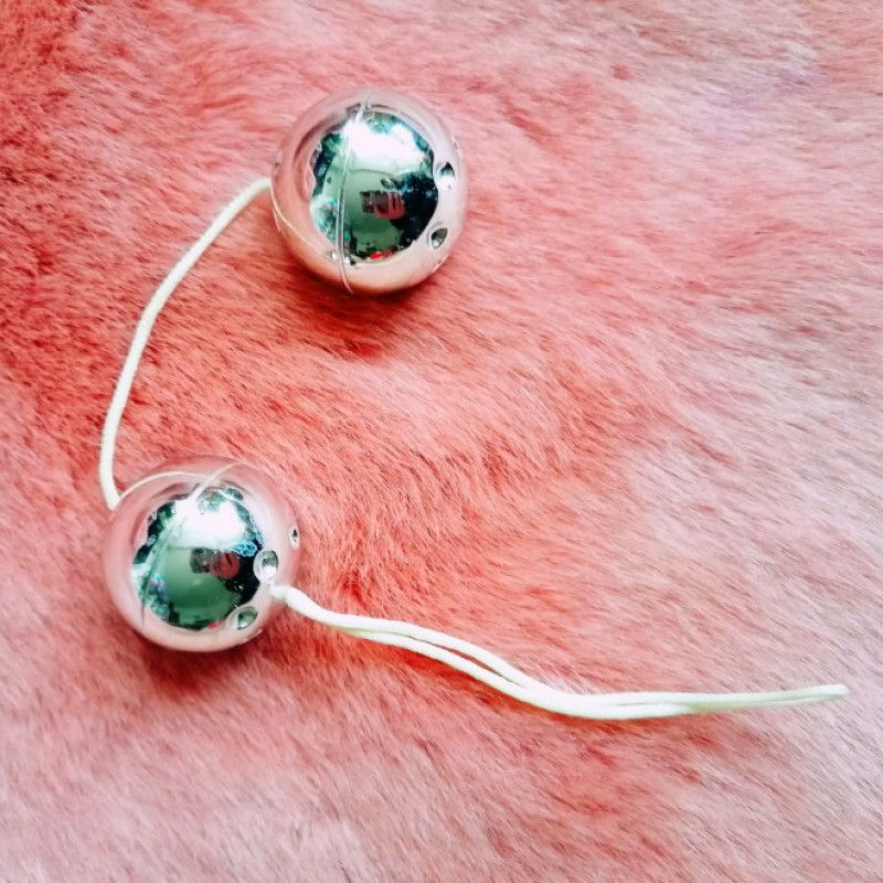 Used silver jiggle balls