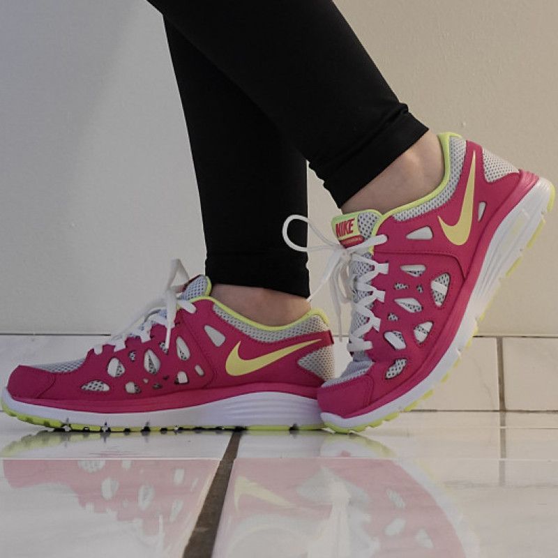 Pink and yellow nikes