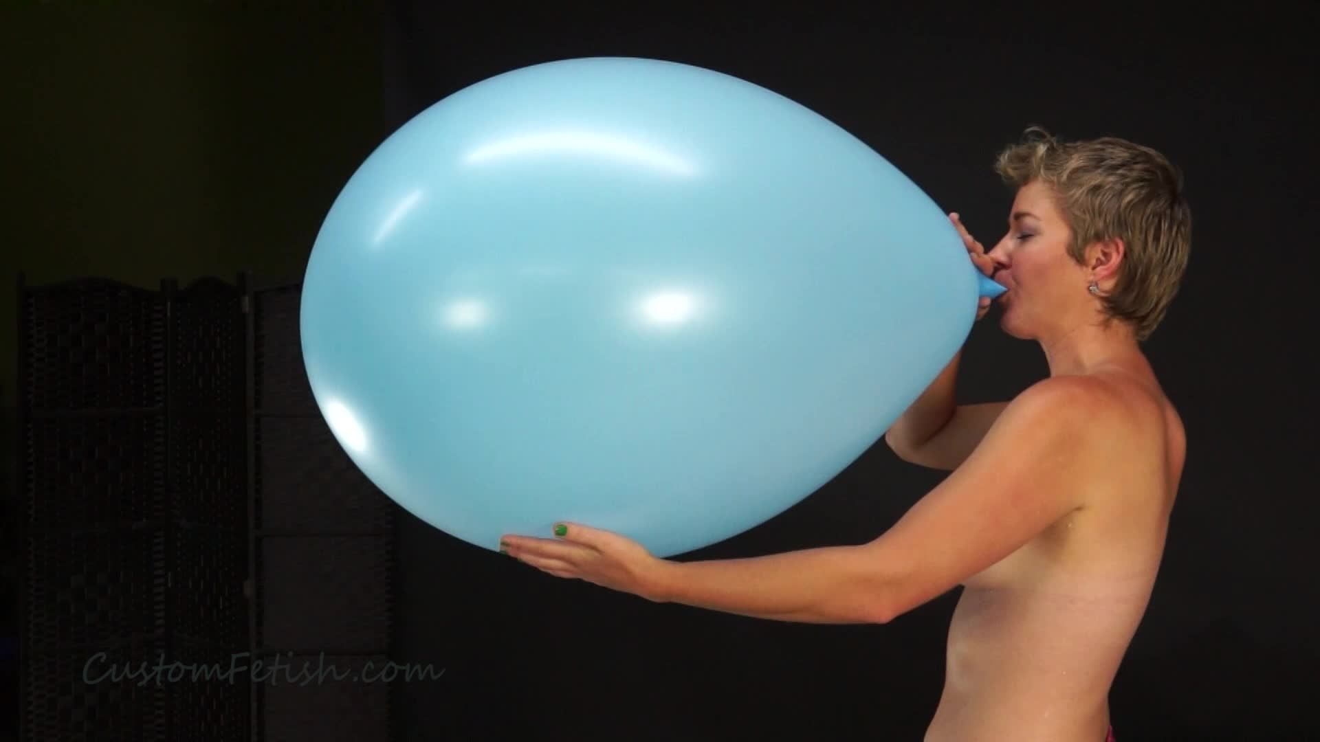 Liz Blow Pops a 30" Balloon