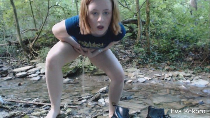 Shy girl struggles to pee in the woods