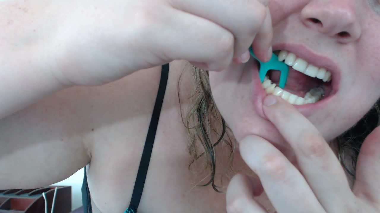 Flossing my perfect teeth