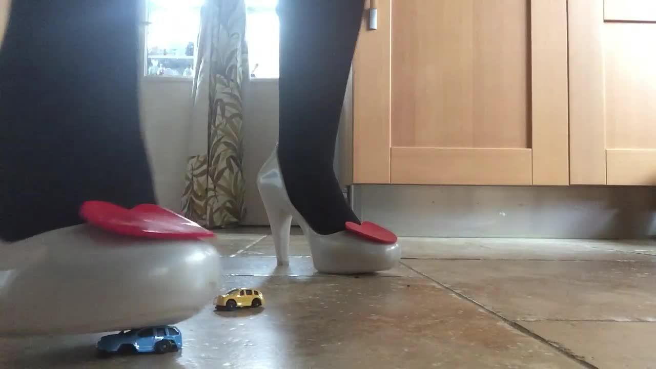 Toy car high heel crush