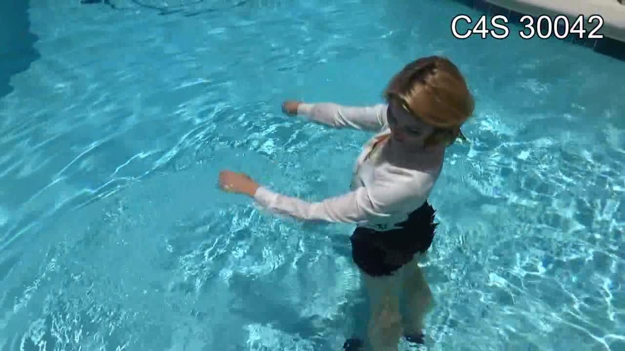 Janira Wolfe wetlook in pool wet look
