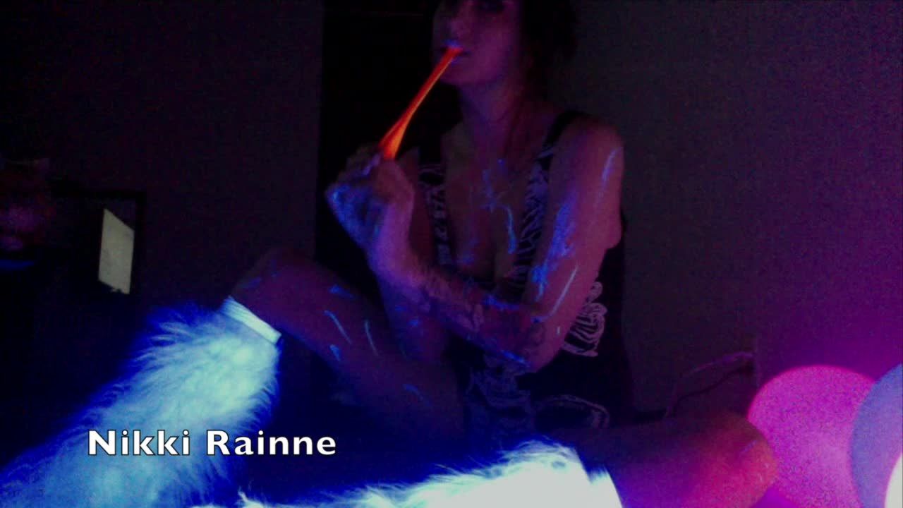 Rave Girl Plays With Balloons