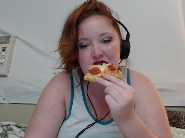 Pizza Eating In Pink Lipstick