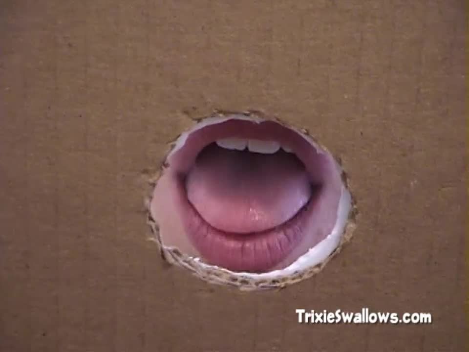 A gloryhole in a box and a cock pops out