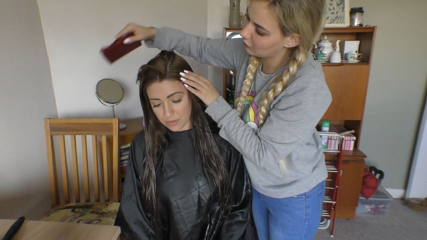 Parting Caroline's Wet  Hair With A Comb