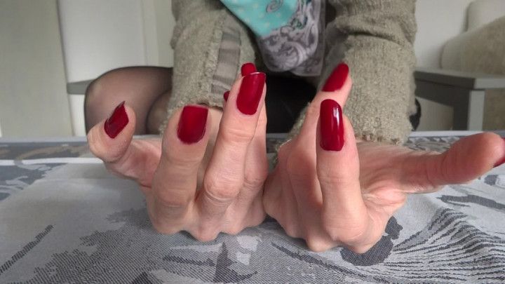 Long dark red fingernails