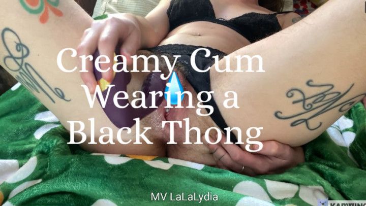 Creamy Cum Wearing a Black Thong