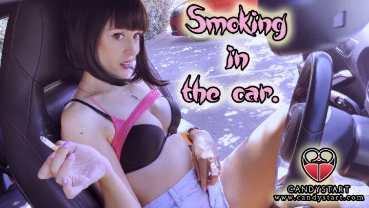 Smoking in the car. Marlboro long
