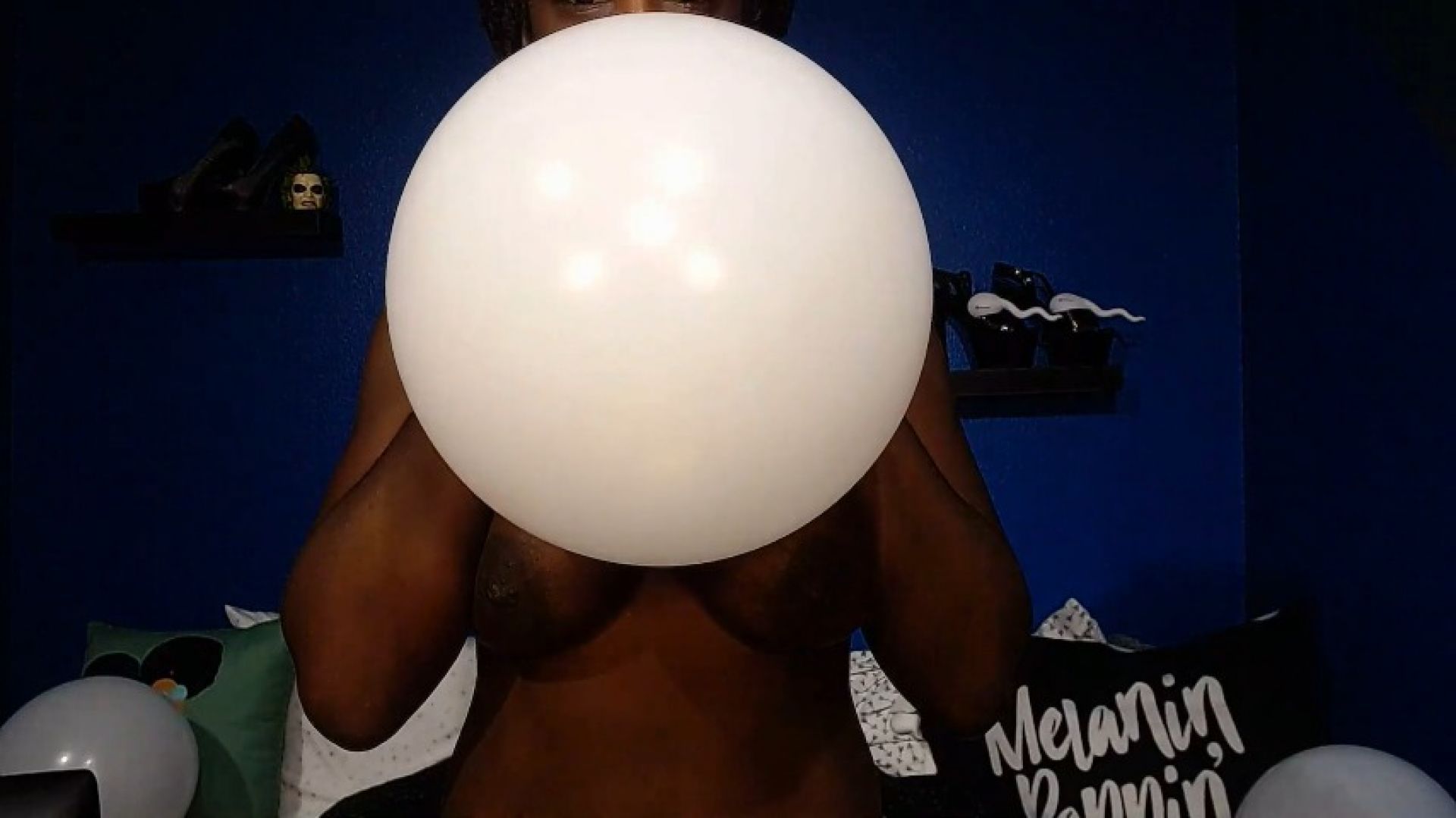 Strip Tease Blowing Up White Balloons