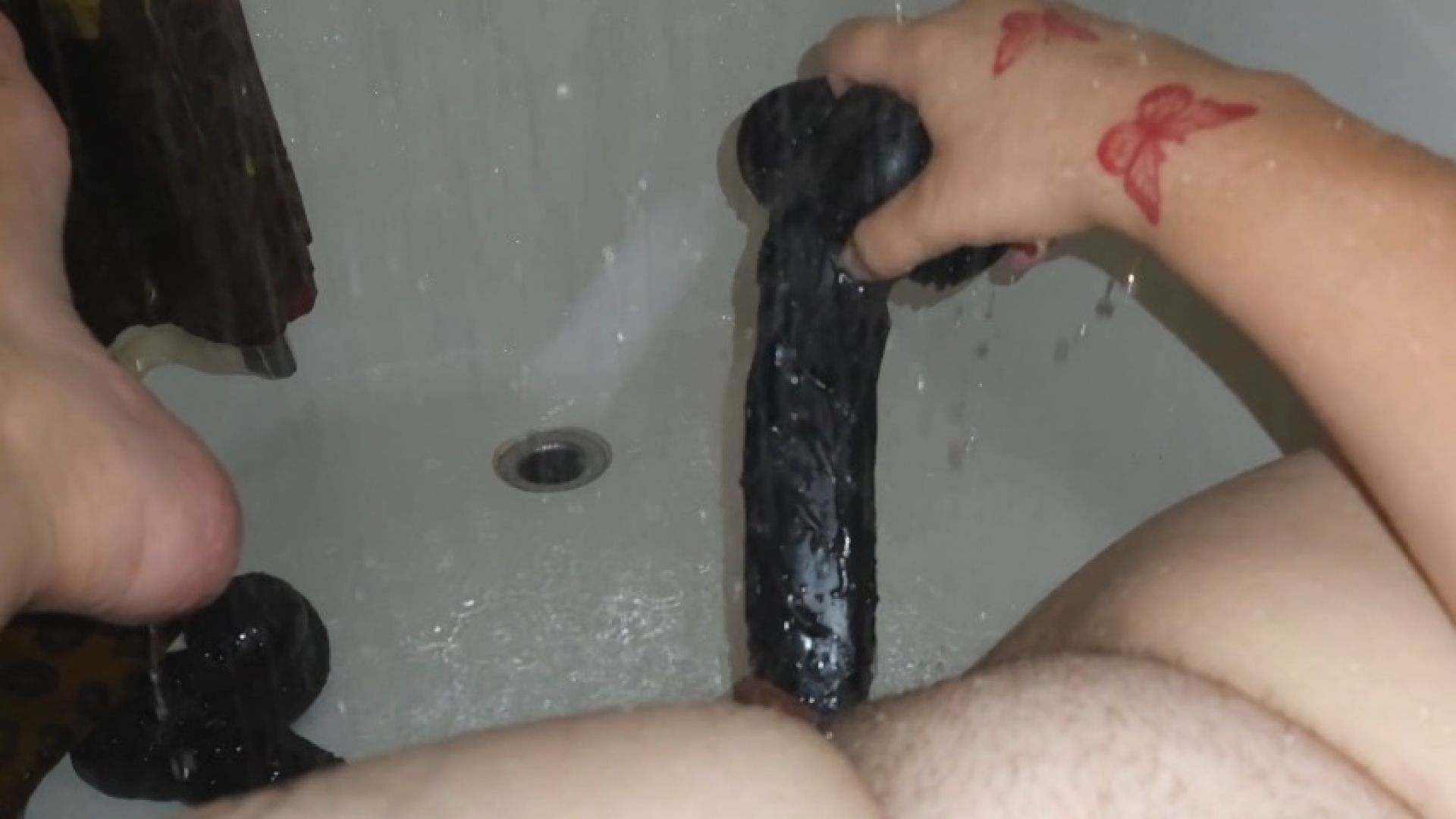 Shower dildo play