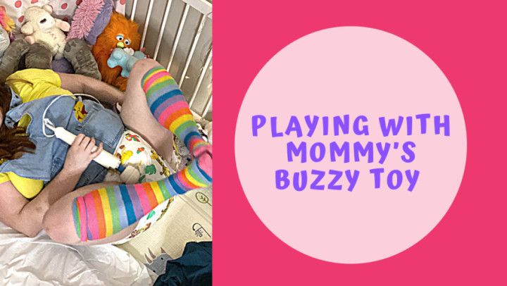 Playing with Mommy's Buzzy Toy