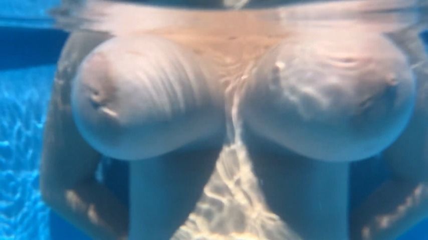 Underwater boobs play and floating