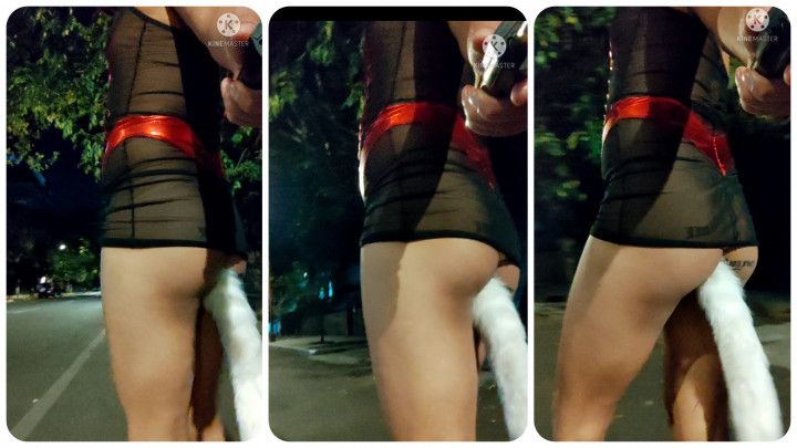 Sissy walking outdoors in anal fox tail