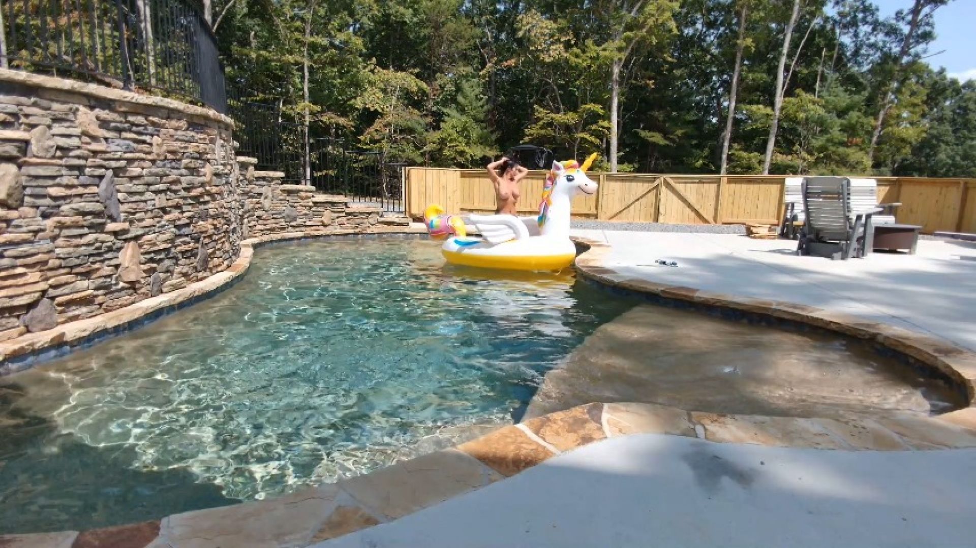 topless pool float damsel