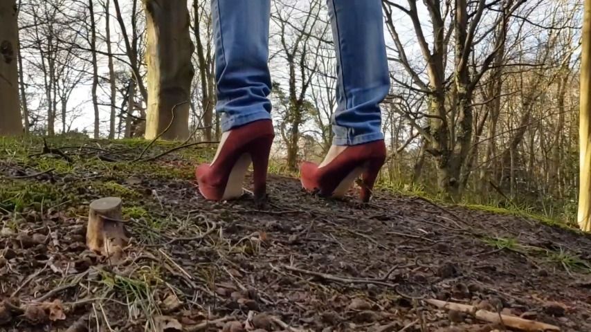 Red crazy high heels in the woods