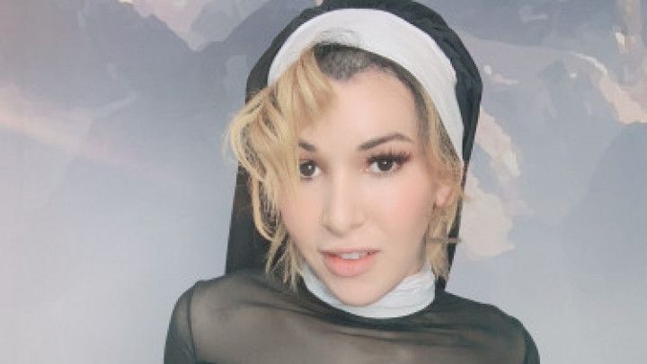 Horny nun fucks a sex doll pussy