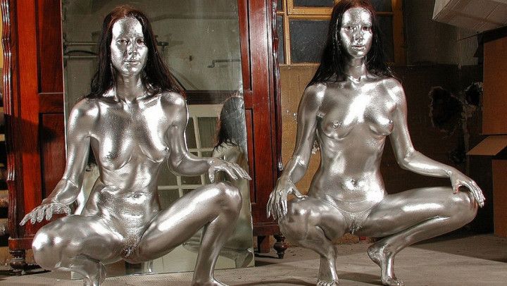 real silver painted statue twins