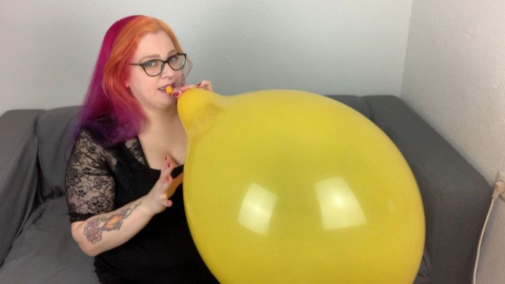 Blowing up and sit to pop a balloon