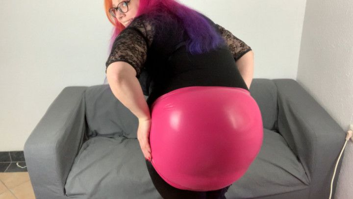 Shiny latex booty! Deflating a balloon