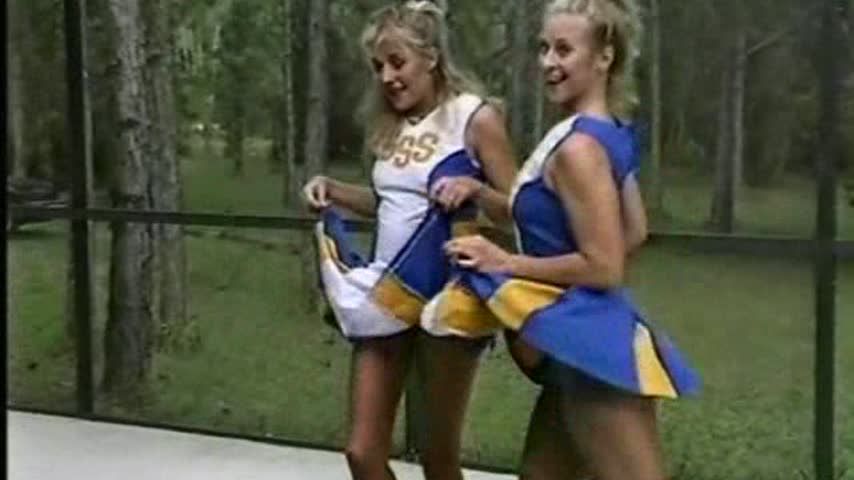 Cheerleaders get oiled up 1