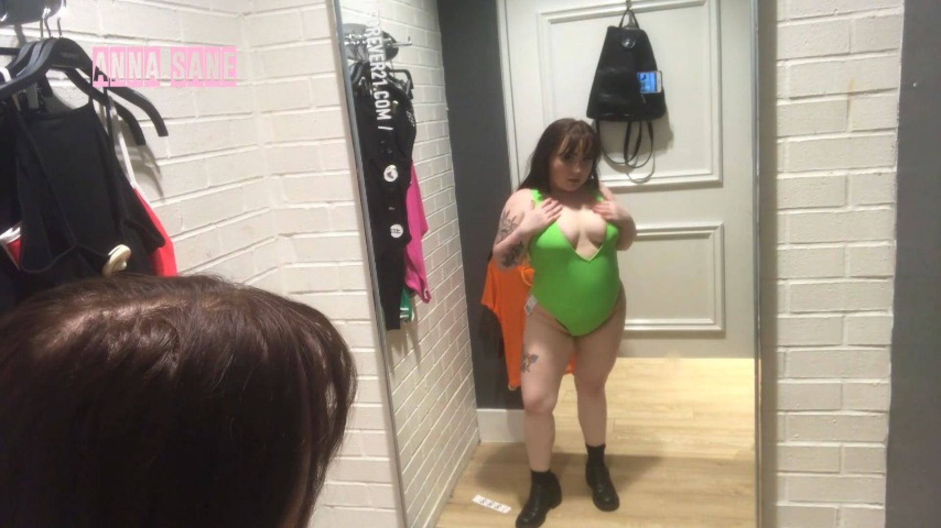 Public Fitting Room Trying Clothes On