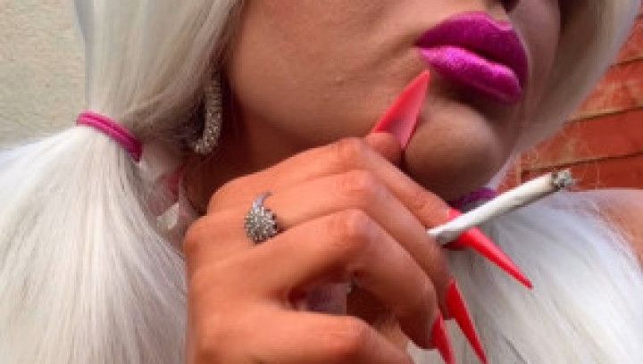 Bimbo smoking with sexy long red nails