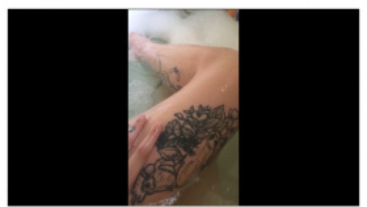 Cheeky bubble bath tease