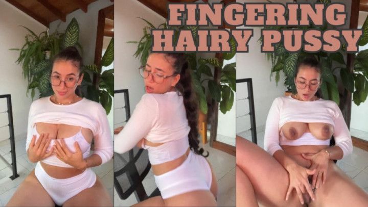 Fingering hairy pussy