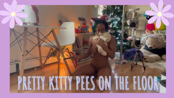 Pretty kitty Pees on the floor