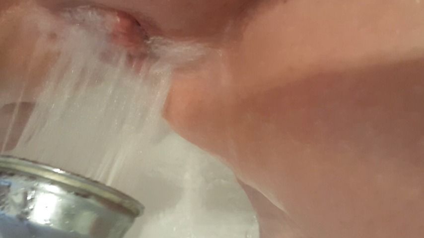 Masturbating with shower head