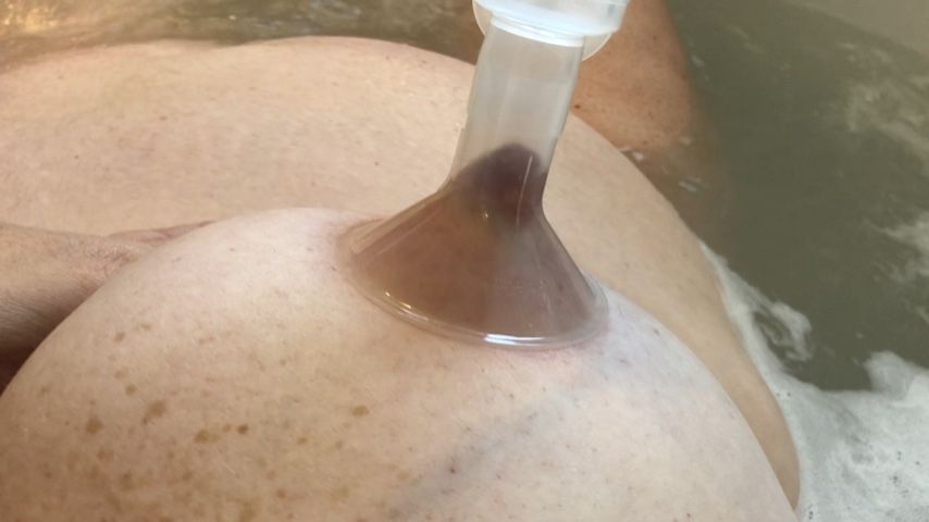 Breast pumping close up