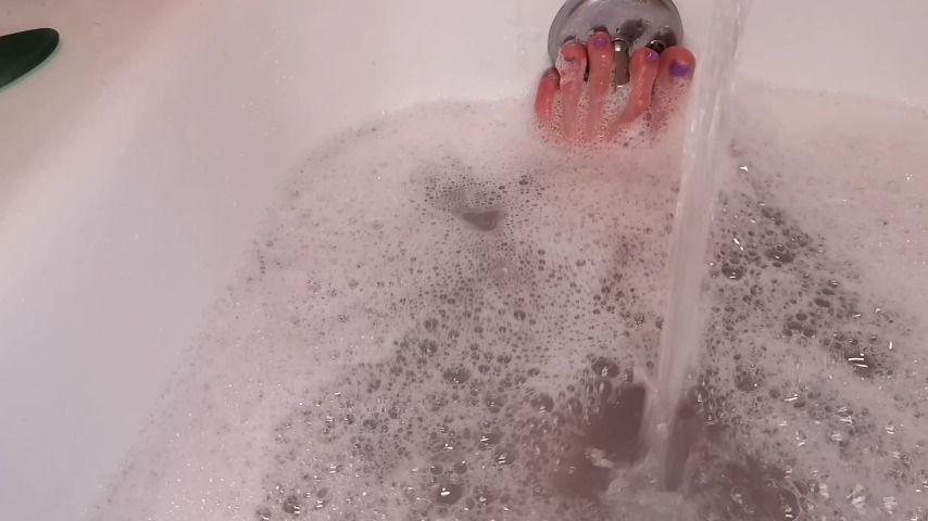 Pretty Purple toes taking a bubble bath