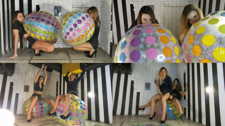 Nastya and Lucy on huge beach balls