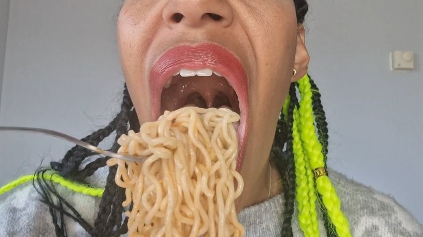 Eating noodles up close