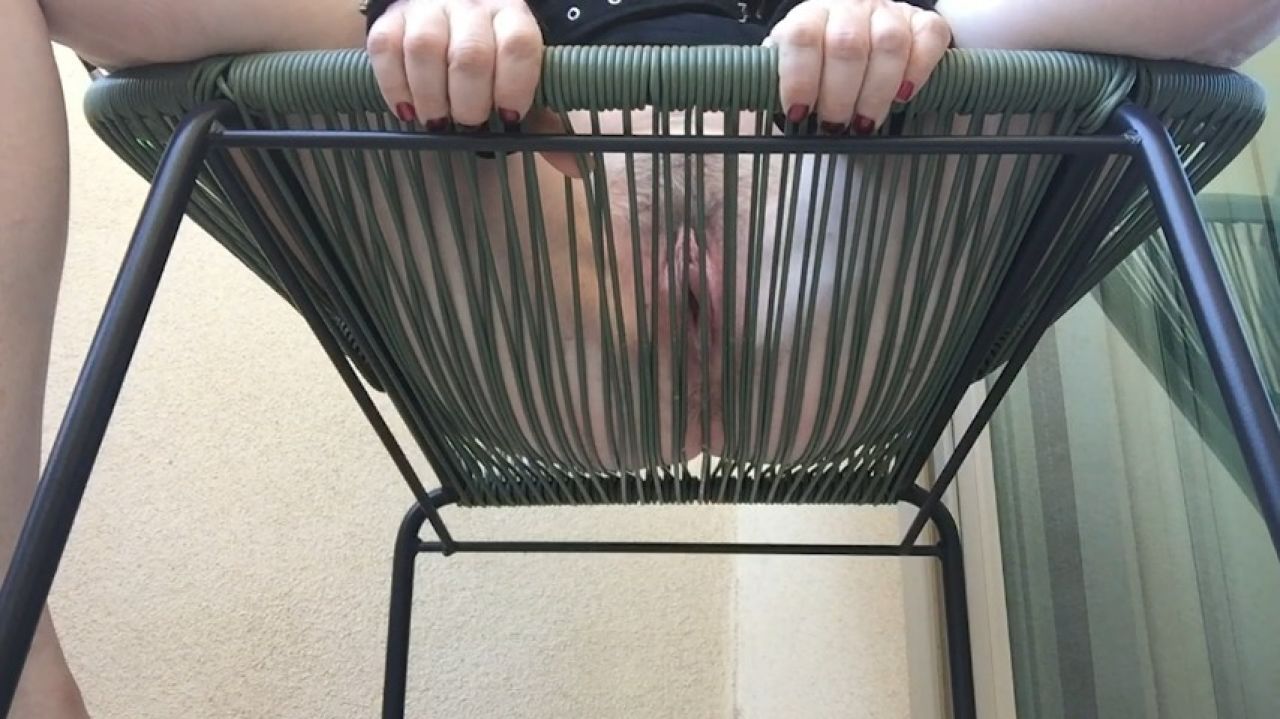 POV Outdoor Peeing Outside in Public Through Chair by Pool