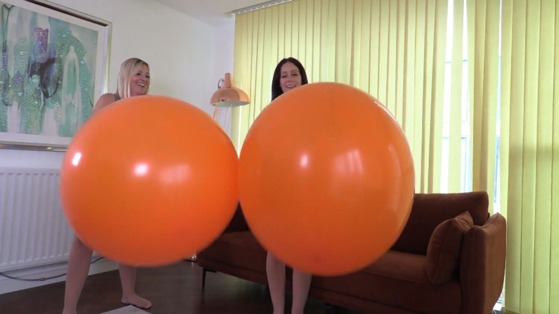 Belle and Charlie have fun on big balloons