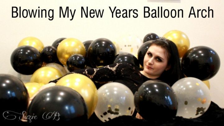 Blowing My New Years Balloon Arch