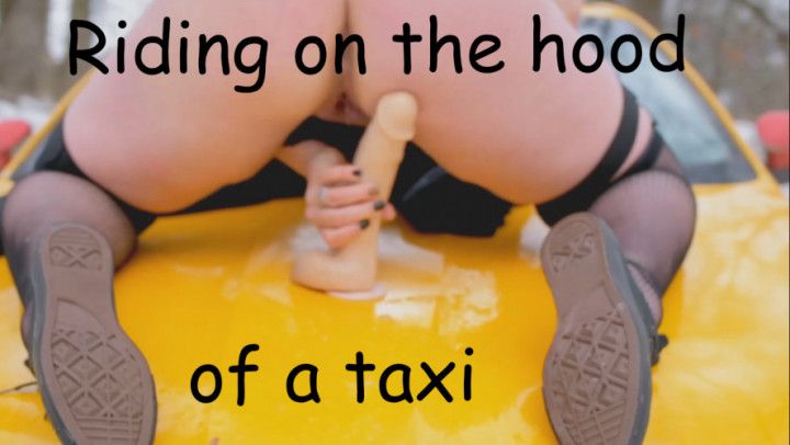 Riding on the hood of a taxi