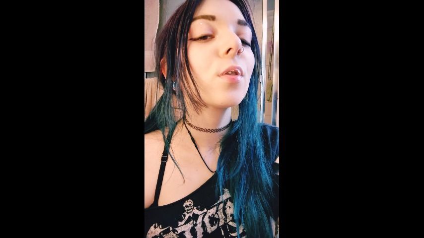 Goth girl blowing spit bubbles