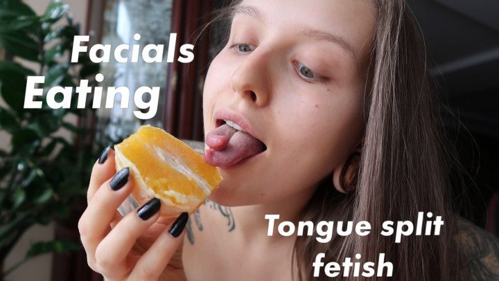 Tongue split babe eats an orange