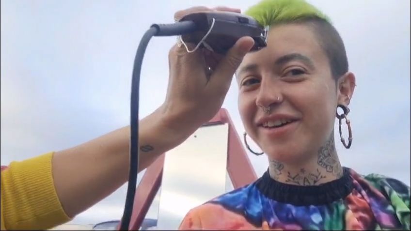 Having my head shaved on my boat