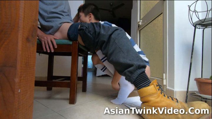 Worker Dominates Tiny Asian Soccer Boy