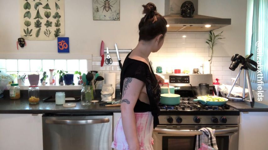 pretty girl cooks and teases