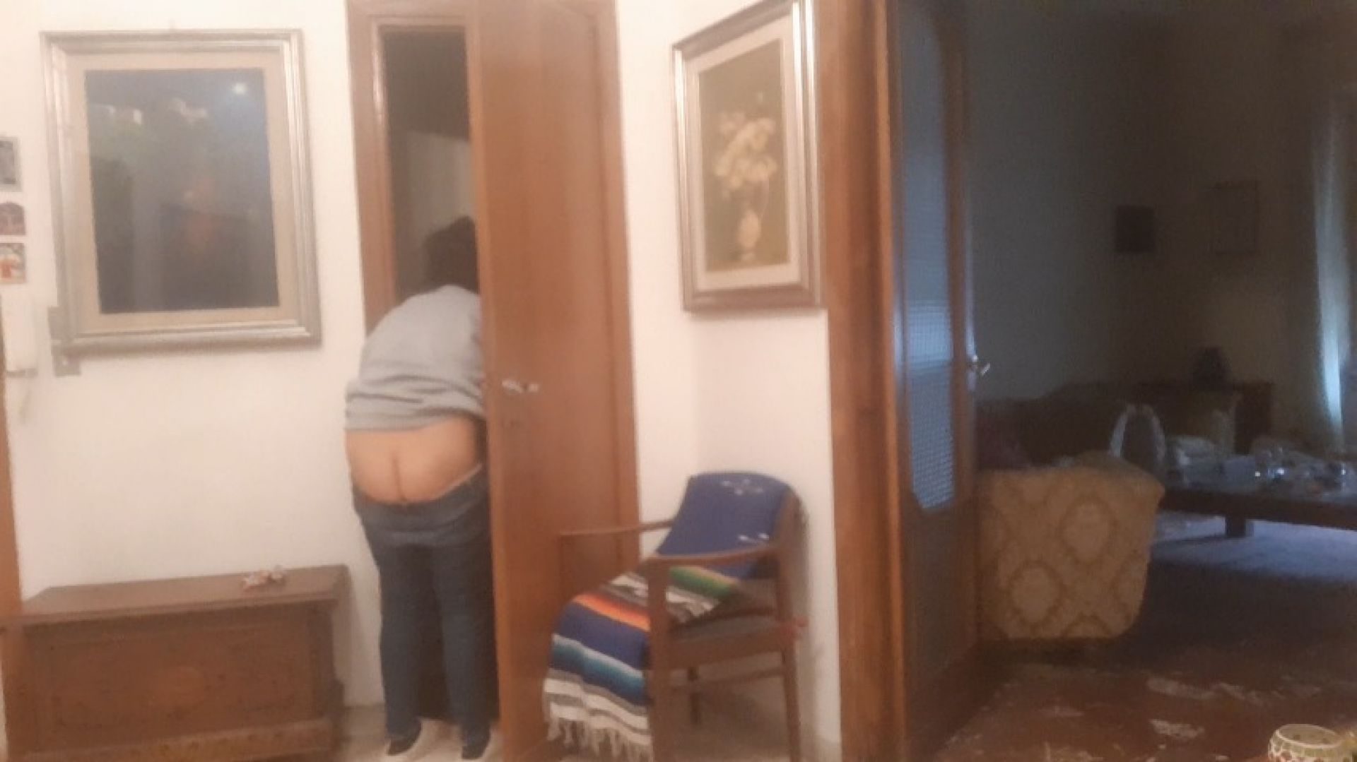 Cleaning the closet showing ass